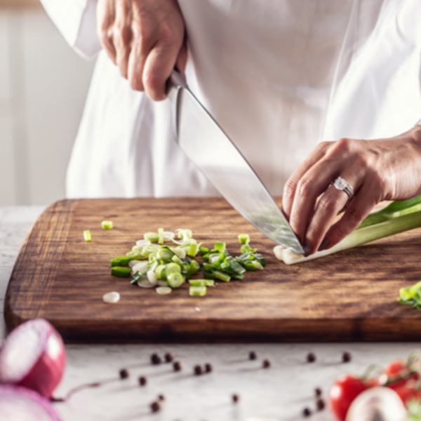 chef chopping onions